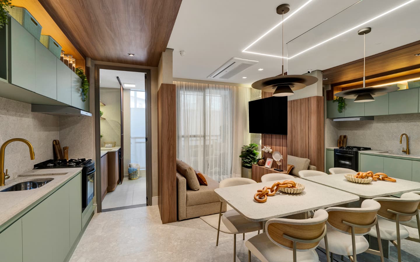 Sala de estar e jantar integrada com cozinha planejada, mesa de jantar e sofa