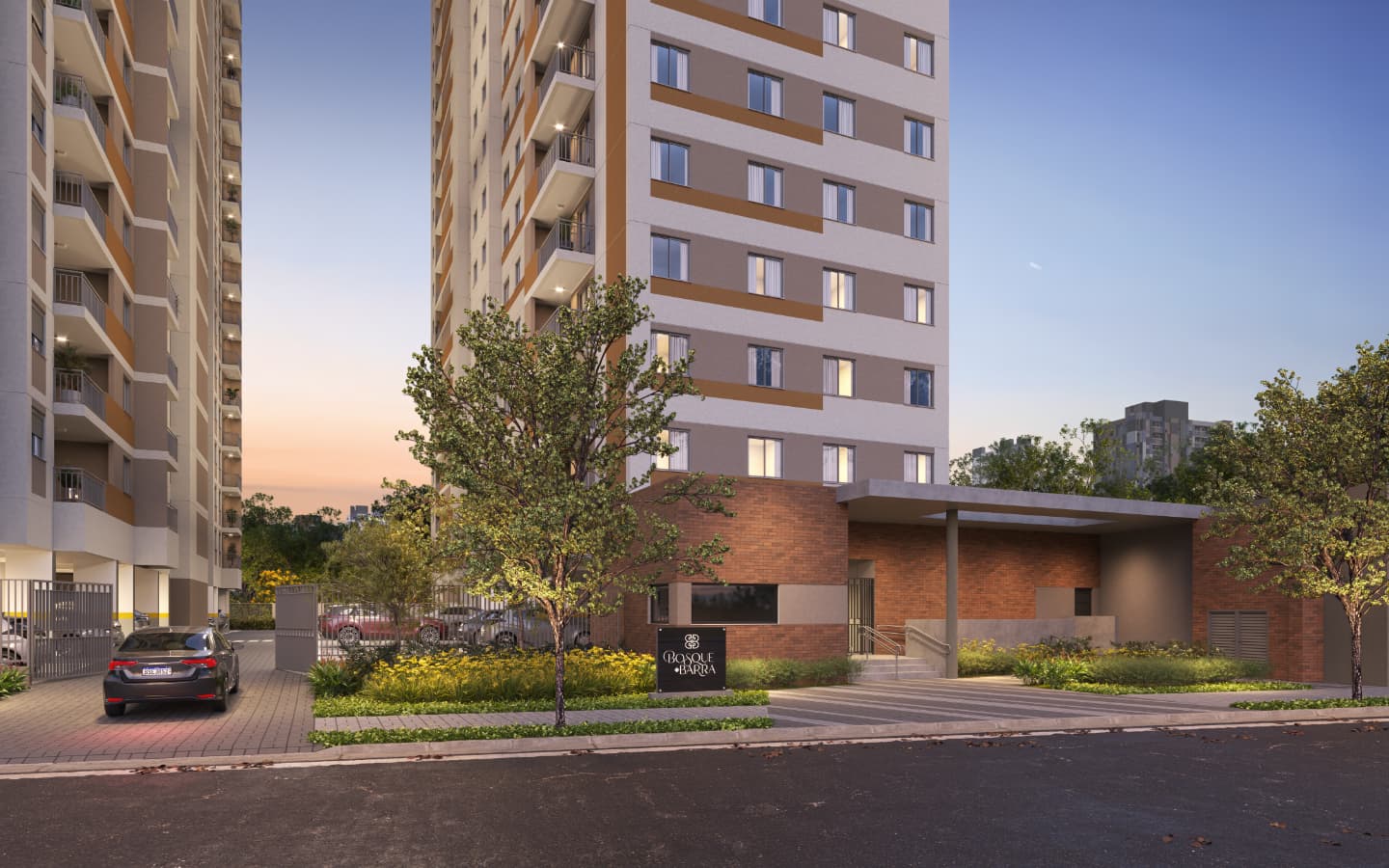 Fachada de prédio residencial com portaria, guarita e paisagismo.