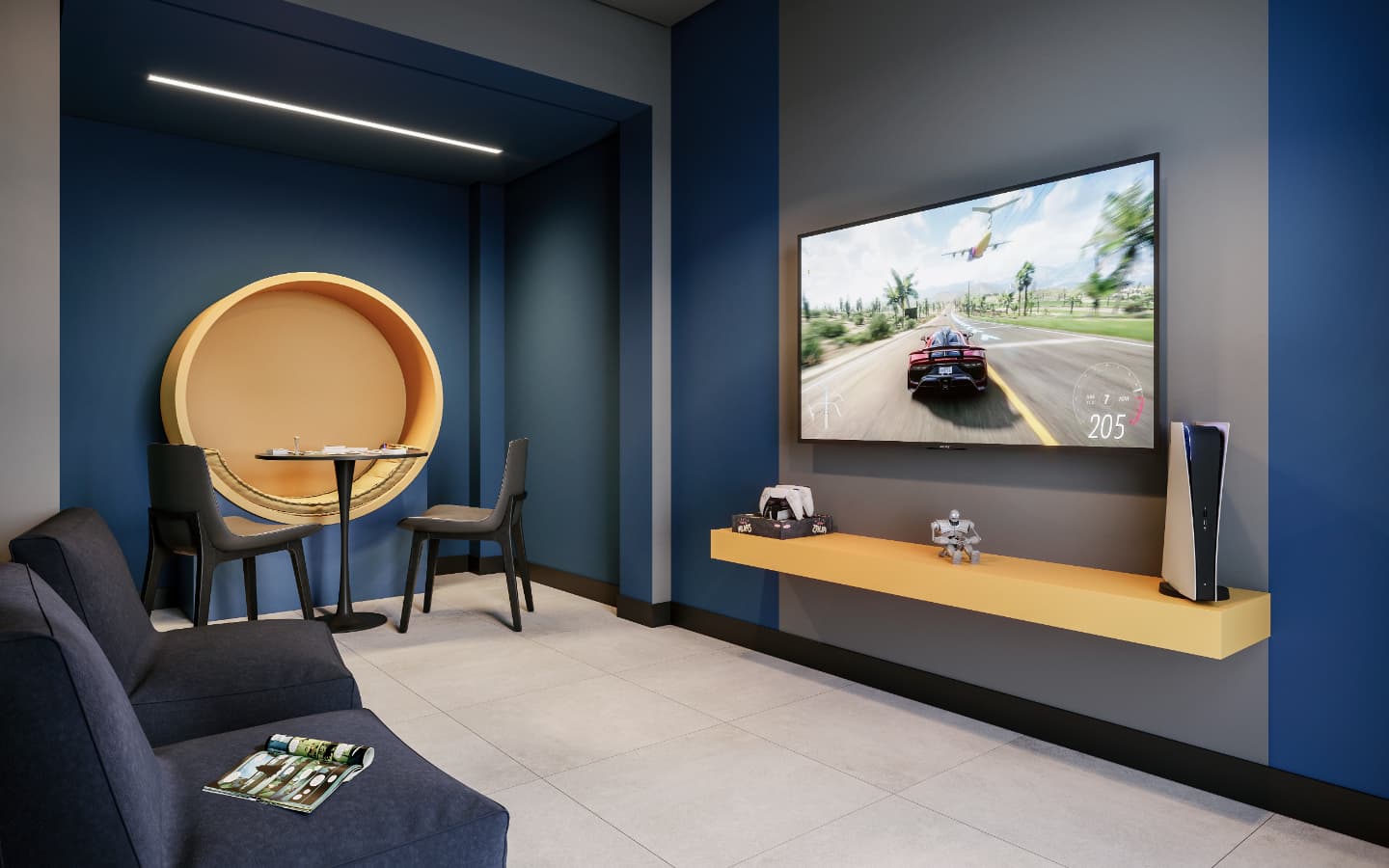 Sala de jogos e TV com poltronas azuis, mesa de apoio e painel com televisão.