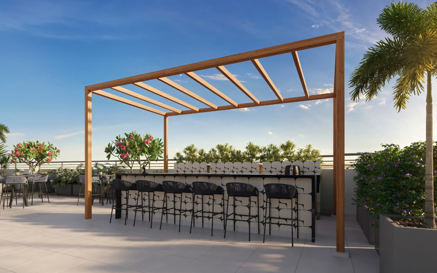 Espaço de bar com balcão revestido por azulejos geométricos e pergolado de madeira